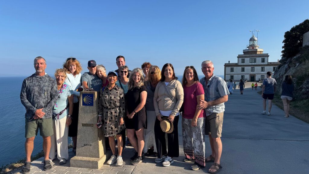 The group at the zero-kilometre marker at Cape Finisterre