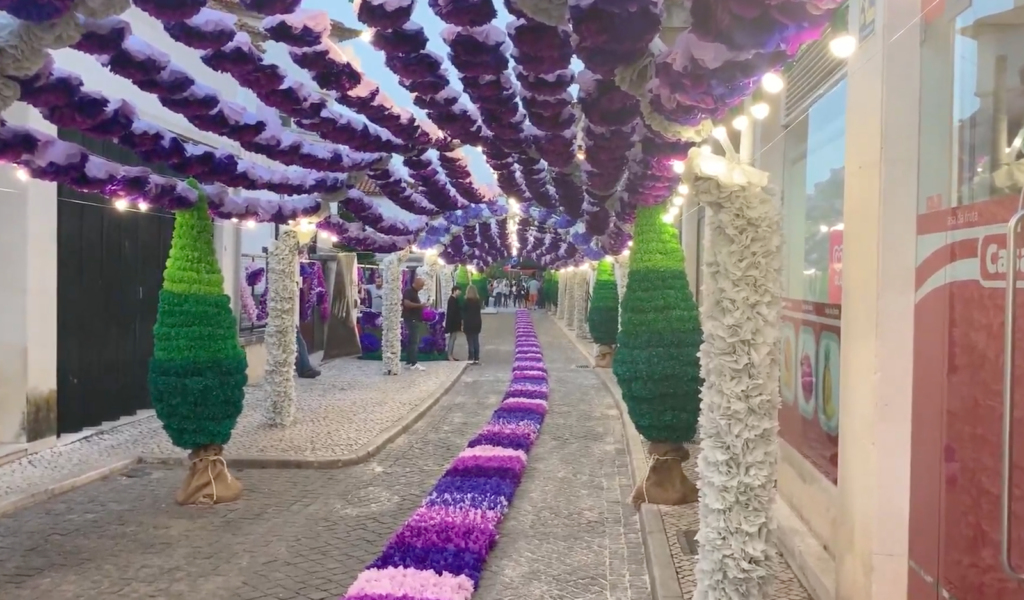 Streets of Tomar draped in paper flowers for the Festa dos Tabuleiros